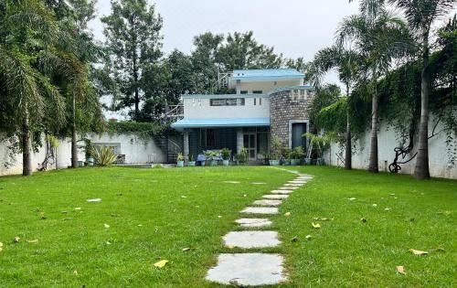 Lush private garden at AruBhi Cottage Dehradun