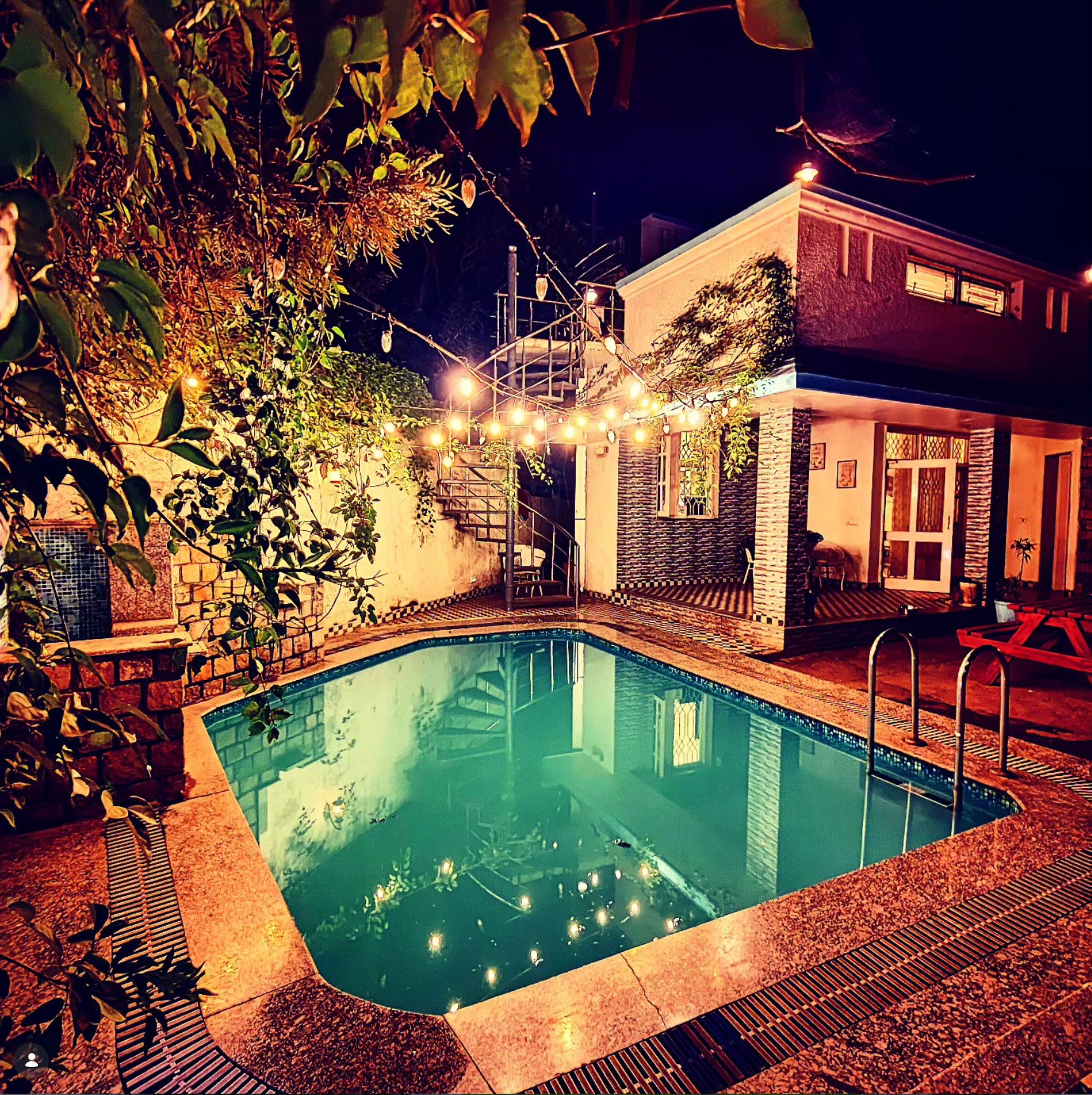 Private pool at night with fairy lights — AruBhi Cottage Dehradun